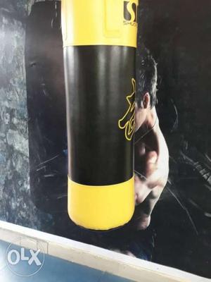 Black And Yellow Heavy punching Bag Photo