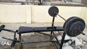 Black Weight Bench And Black Barbell