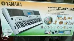 Gray And Black Electronic Keyboard