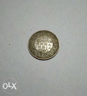 Old antique coin (one quarter anna)