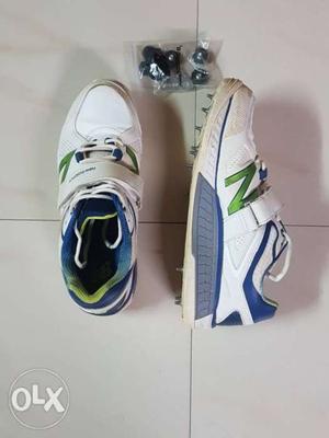Pair Of White-and-blue New Balance Shoes