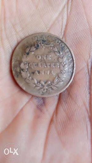 Round Bronze-colored 1 Quarter Indian Anna Coin