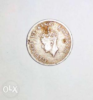 Round Gold-colored King Emperor George VI Coin
