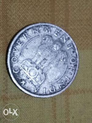 Round Silver-colored Coin