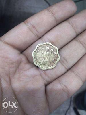 Scalloped Edge Gold-colored Indian Paise Coin