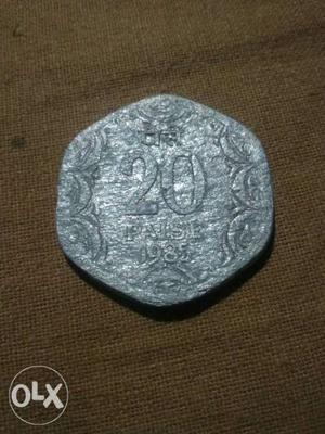 Silver-colored 20 Indian Paisa Coin