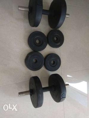 Two Black Dumbbells With Four Plates