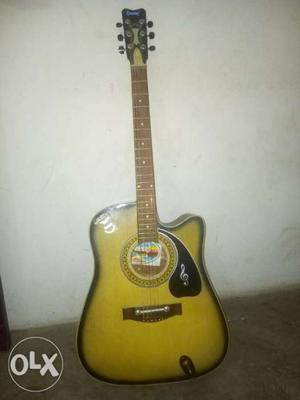 Yellow Single-cutaway Acoustic Guitar