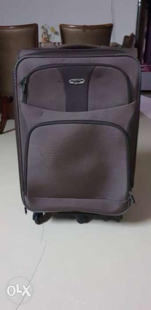 24"Brown And Black Luggage Bag