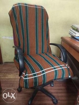 Blue, Green, And White Striped Padded Armchair