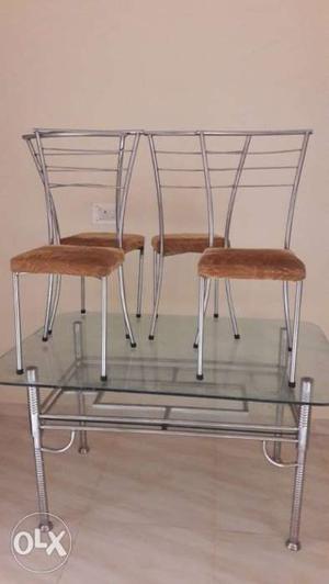Dinning table with four chairs Stainless steel