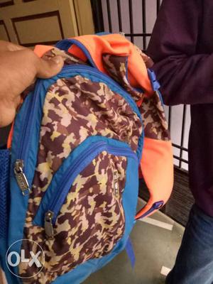 Orange, Brown, And Blue Backpack
