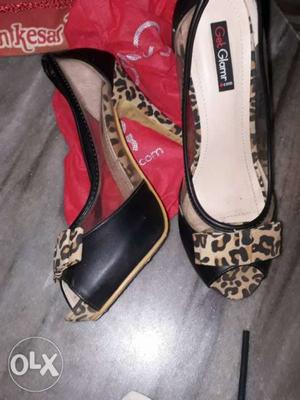 Pair Of Brown-and-white Peep Toe Pumps