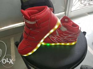 Pair Of Red Basketball rechargeable Shoes for kids size uk 8