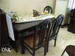 Teak wood dining table with 4 chairs for immediate sale