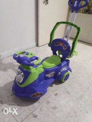 Toddler's Purple And Green Ride-on Toy