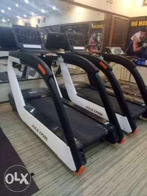 Two Black-and-white Hulk Automatic Treadmills