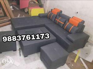 Black Leather Sectional Couch And Throw Pillows