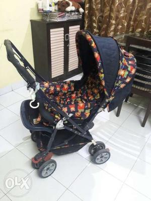 Mee Mee brand Blue And Red Stroller