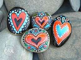 Painted river pebbles for gifts, home decorations