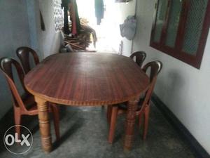 Round Brown Wooden Table With Four Chairs Dining Set