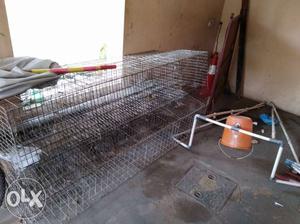 Two Gray Steel Pet Cages