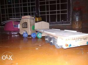 White And Blue Plastic Toy Truck