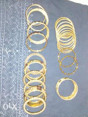 All four sets of metal bangles