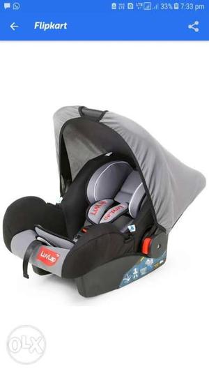 Baby's Black And Gray Car Seat Carrier