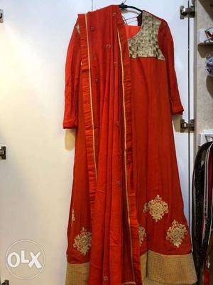 Beautiful orange suit in almost new condition in