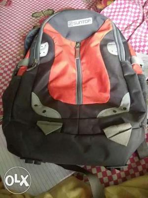 Black And Orange Suntop Backpack