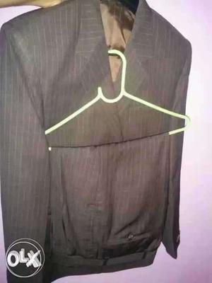 Brown coat used only once with trouser 42 waist