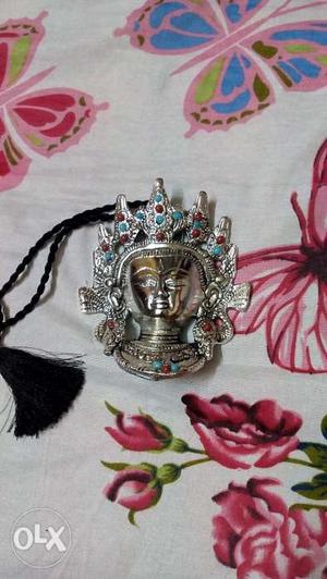 Buddha face junk jewellery