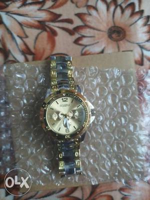 Gold color seal packed watch mans