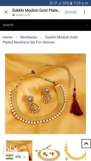 Gold-colored And Red Gemstone Necklace