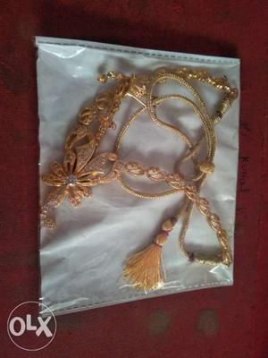 Meatal set of pure ad with. ear ring golden