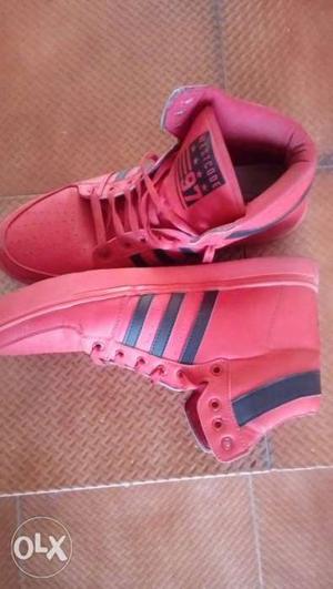 Original red colour sneaker for size 10