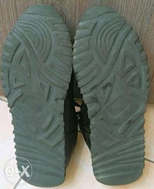 Pair Of Black Leather Gladiator Sandals