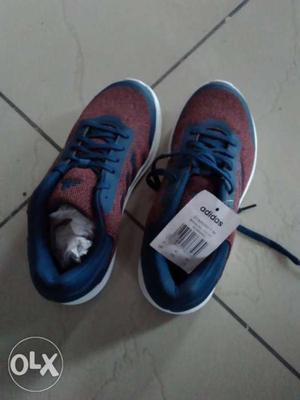 Pair Of Blue-and-black Running Shoes