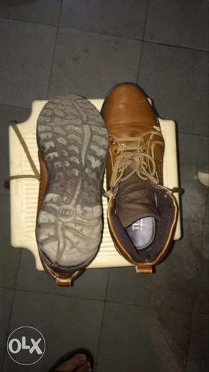 Pair Of Brown Leather Shoes