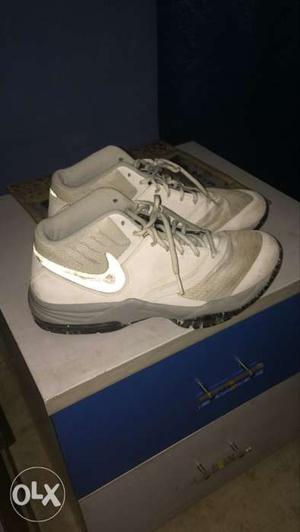 Pair Of White Nike Basketball Shoes