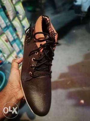 Paired Brown Leather Shoe