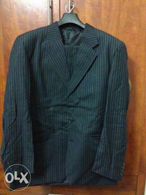 Peter England black full suit black XL size in very good