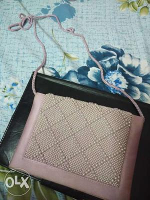 Pink pearl sling bag
