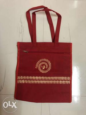 Red carry bag. Brand New. good storage space.