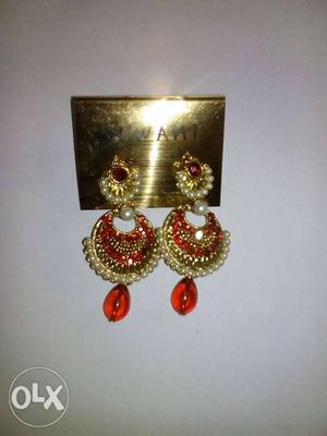 Red golden pearl earring