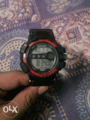 Round Black And Red Digital Watch