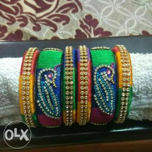 Six Multicolored Silk Thread Bangles