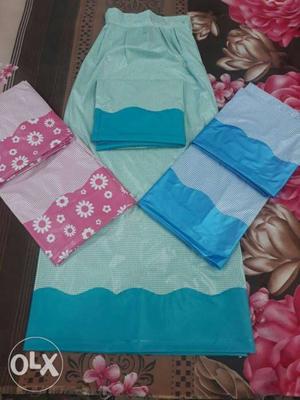 Teal, White, And Pink Textile