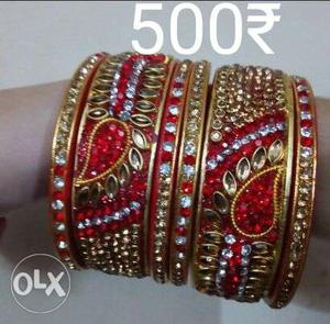 Two Beaded Gold-colored-and-red Bangles With 500 Text